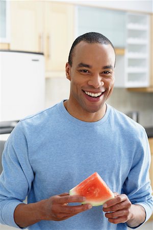 Portrait of Man Holding Slice of Watermelon Stock Photo - Rights-Managed, Code: 700-00897422