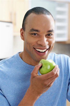 humans eating an apple