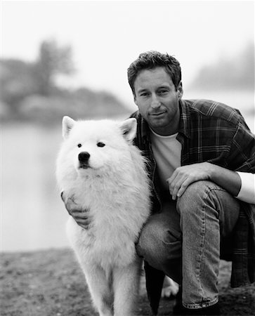 Portrait of Man With Dog Foto de stock - Con derechos protegidos, Código: 700-00897698