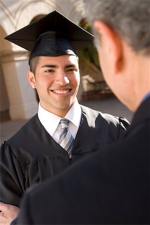 simsearch:695-05763421,k - Father with Son at Graduation Ceremony Foto de stock - Con derechos protegidos, Código: 700-00897805