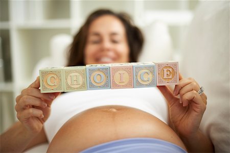 Pregnant Woman Spelling Choice with Blocks Stock Photo - Rights-Managed, Code: 700-00916997