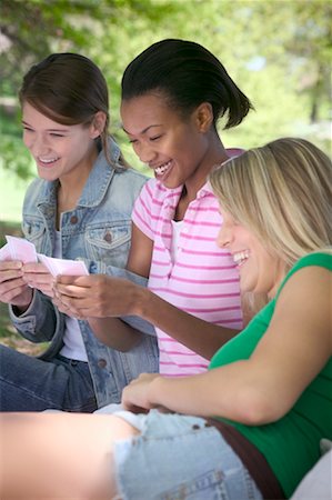 Friends Playing Cards Outdoors Stock Photo - Rights-Managed, Code: 700-00917025