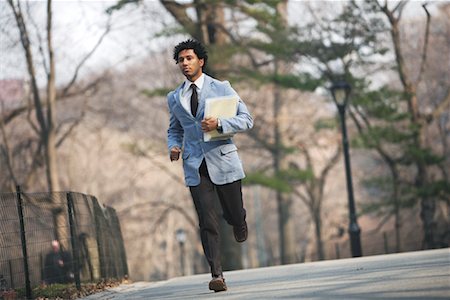 running business front - Businessman Running with File Stock Photo - Rights-Managed, Code: 700-00917732