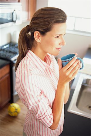 Portrait of Woman Drinking Coffee Stock Photo - Rights-Managed, Code: 700-00918025