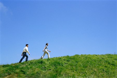 Couple Climbing Hill Stock Photo - Rights-Managed, Code: 700-00918045