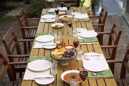 fancy setting - Table On Patio Set For Dinner Stock Photo - Rights-Managed, Code: 700-00918123