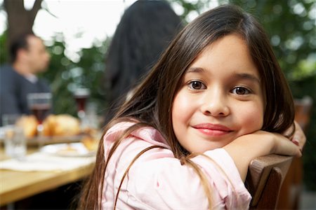 Girl At Family Dinner Outdoors Stock Photo - Rights-Managed, Code: 700-00918148