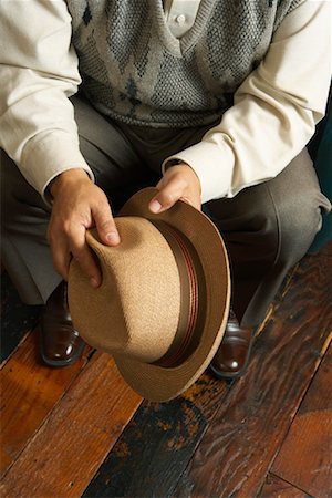 simsearch:700-03407270,k - Close Up of Man Holding Hat Stock Photo - Rights-Managed, Code: 700-00918219