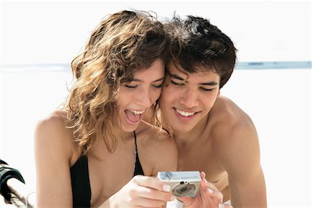 Couple Looking at Digital Camera Stock Photo - Rights-Managed, Code: 700-00918341