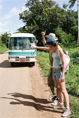 Couple en attente pour le Bus, Zanzibar, Tanzanie Photographie de stock - Rights-Managed, Code: 700-00918359