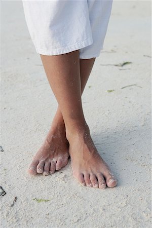 Close Up of Feet on Sand Stock Photo - Rights-Managed, Code: 700-00918377