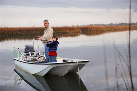 Grandfather Fishing With Grandson, South Carolina, USA Stock Photo - Rights-Managed, Code: 700-00910019