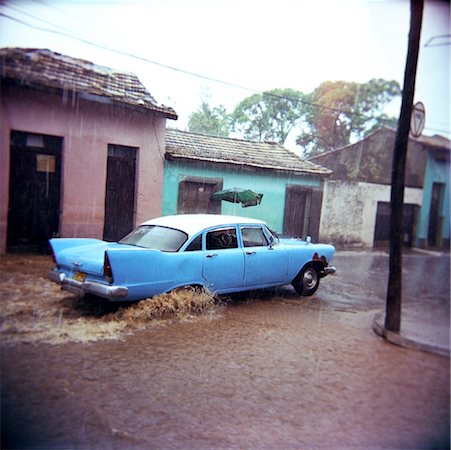 puddle street - Car Driving through Flooded Street, Trinidad Stock Photo - Rights-Managed, Code: 700-00910435