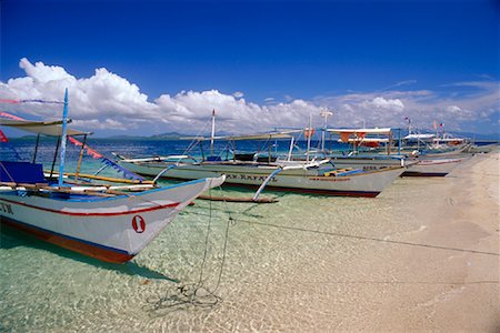 filipino (lugares y cosas) - Bangka Boats on Shore, Snake Island, Honda Bay, Palawan Island, Philippines Foto de stock - Con derechos protegidos, Código: 700-00910883