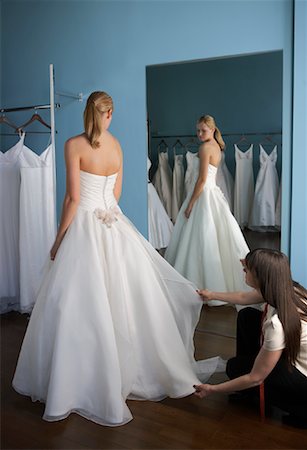 simsearch:700-02121266,k - Woman Trying on Wedding Gown Stock Photo - Rights-Managed, Code: 700-00911213