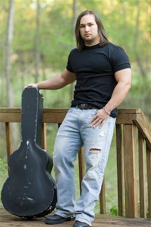 people guitar case - Man on Porch with Guitar Case Stock Photo - Rights-Managed, Code: 700-00911473