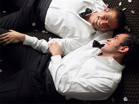 gay men in suits in office