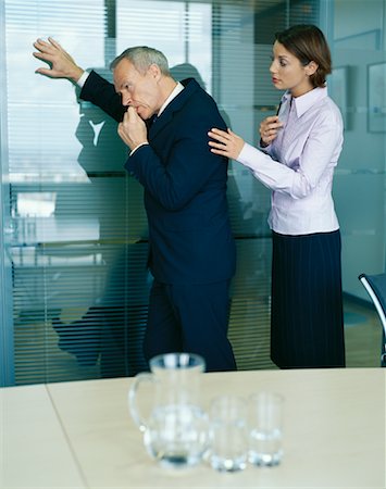 female manager talking to concerned employee - Business People in Office Stock Photo - Rights-Managed, Code: 700-00934770