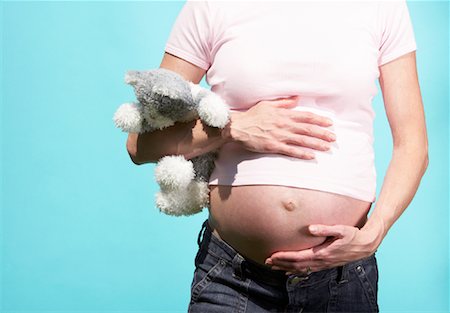 pregnant animals - Pregnant Woman Holding Stuffed Animal Stock Photo - Rights-Managed, Code: 700-00935176