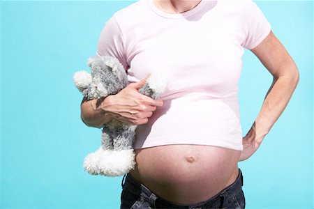 pregnant animals - Pregnant Woman Holding Stuffed Animal Stock Photo - Rights-Managed, Code: 700-00935178