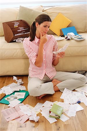 disorder in house - Woman Organizing Bills Stock Photo - Rights-Managed, Code: 700-00948047