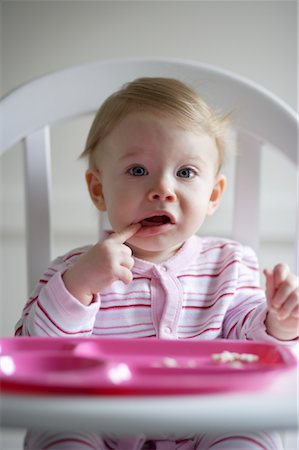 Baby Girl with Finger in Mouth Stock Photo - Rights-Managed, Code: 700-00948853