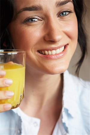 simsearch:700-00954536,k - Woman Drinking Orange Juice Stock Photo - Rights-Managed, Code: 700-00954560