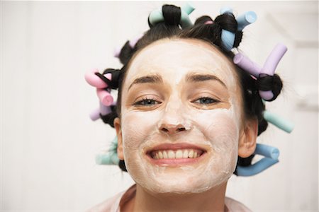 Woman Wearing Face Cream And Curlers Stock Photo - Rights-Managed, Code: 700-00954574