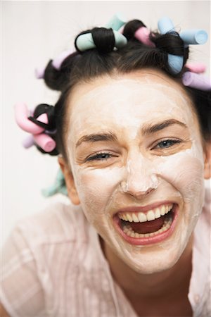 Woman Wearing Face Cream And Curlers Stock Photo - Rights-Managed, Code: 700-00954575