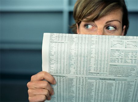 Woman Holding Newspaper Stock Photo - Rights-Managed, Code: 700-00954633