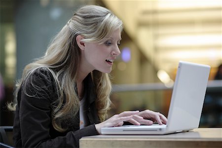 Woman Using Laptop Stock Photo - Rights-Managed, Code: 700-00955218