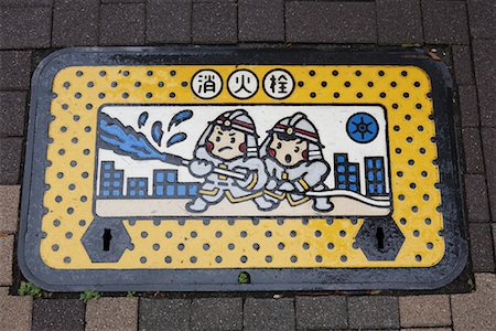 spraying water hose - Fire Hydrant Cover, Tokyo, Japan Stock Photo - Rights-Managed, Code: 700-00955354