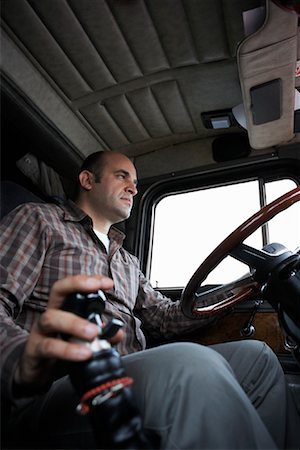 semi truck cab interior - Portrait of Truck Driver Foto de stock - Con derechos protegidos, Código: 700-00955383