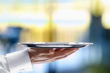 Waiter Carrying Empty Tray Stock Photo - Rights-Managed, Code: 700-00955639