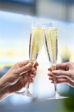 pictures of man at new years eve party - Couple Toasting with Champagne Stock Photo - Rights-Managed, Code: 700-00955632