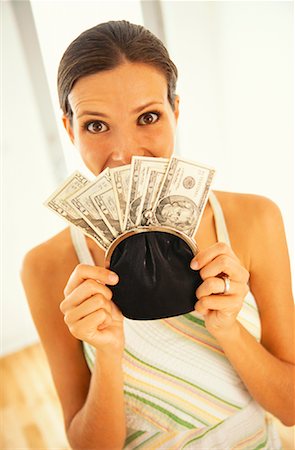 simsearch:700-03466512,k - Portrait of Woman with Cash in Purse Stock Photo - Rights-Managed, Code: 700-00984280