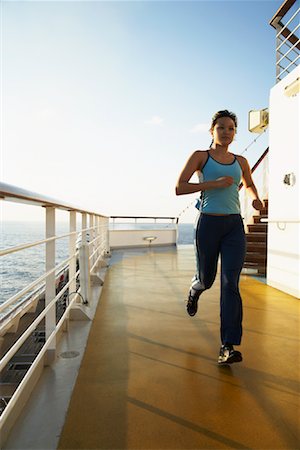 Femme Jogging sur le navire de croisière Photographie de stock - Rights-Managed, Code: 700-00983214