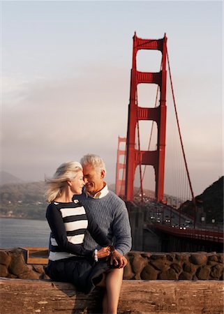 famous people in california - Couple Sitting by Golden Gate Bridge, San Francisco, California, USA Stock Photo - Rights-Managed, Code: 700-00983391