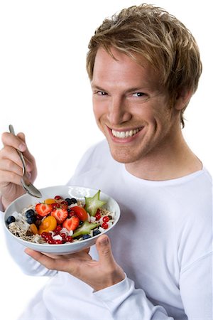 ruprecht stempell - Man Eating Cereal Fotografie stock - Rights-Managed, Codice: 700-01014437