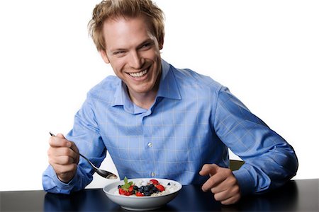 ruprecht stempell - Man Eating Cereal Fotografie stock - Rights-Managed, Codice: 700-01014438