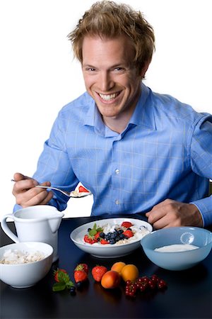 Man Eating Breakfast Stock Photo - Rights-Managed, Code: 700-01014432