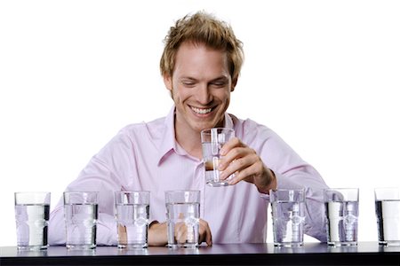 satisfied (thirst) - Man Drinking Water Foto de stock - Con derechos protegidos, Código: 700-01014476