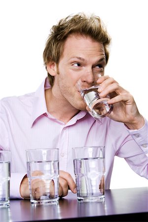 simsearch:700-00782222,k - Man Drinking Glass of Water Foto de stock - Con derechos protegidos, Código: 700-01014478