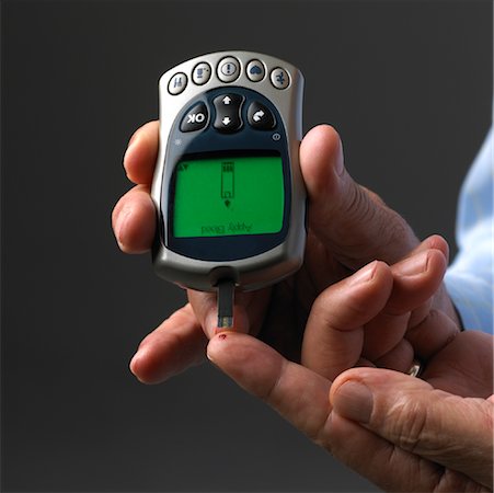 diabetes man - Man Testing Blood Sugar Stock Photo - Rights-Managed, Code: 700-01014555