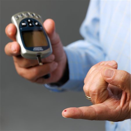 diabetes man - Man Testing Blood Sugar Stock Photo - Rights-Managed, Code: 700-01014552
