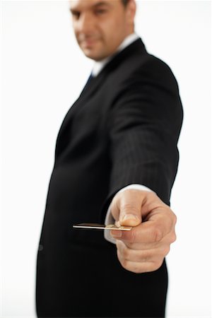 Businessman with Credit Card Stock Photo - Rights-Managed, Code: 700-01014981