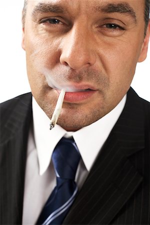 drogato - Businessman Smoking Joint Fotografie stock - Rights-Managed, Codice: 700-01015004