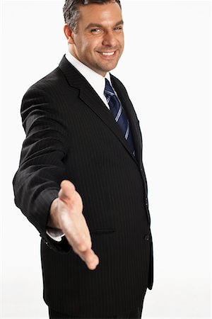 Businessman Extending Hand Stock Photo - Rights-Managed, Code: 700-01015000