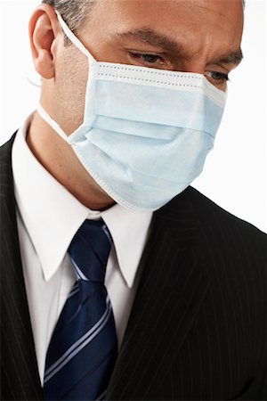 simsearch:700-01015015,k - Businessman with Surgical Mask Stock Photo - Rights-Managed, Code: 700-01015010