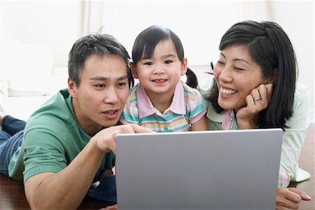 Family Using Lap Top Computer Stock Photo - Rights-Managed, Code: 700-01029696